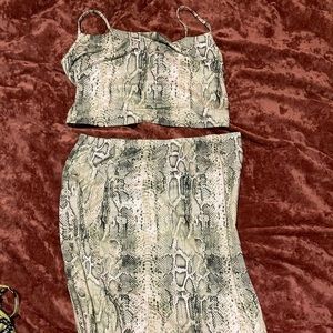 Matching set with cropped top & midi skirt w/ leg slit.